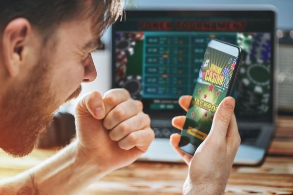 Bangladesh user checking 7 apk virtual sports sections on smartphone